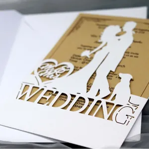 Laser cut white wedding invitation set with Mr & Mrs heart pattern and kraft paper insert