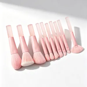 10-piece peach pink makeup brush set with matte handles and soft synthetic bristles