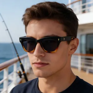 Detailed shot of gradient sunglasses frames with gold star metal accents and polarized lenses