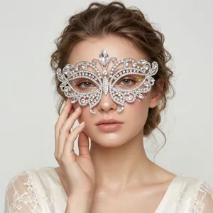 Detailed close-up of luxury silver butterfly rhinestone mask with sparkling crystals