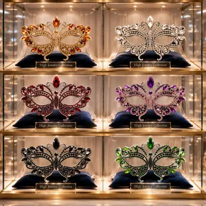 Luxurious butterfly-shaped masks with rhinestones displayed on blue velvet in various colors