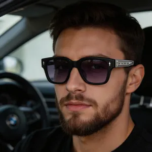 Polarized square sunglasses for men featuring gothic cross detail in a car interior