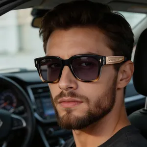 Close-up of golden metal temples with cross carvings on gradient lens sunglasses