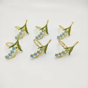 Set of 6 blue lily of the valley napkin rings with golden alloy base for table decor