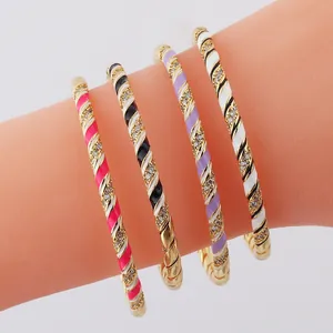 Adjustable gold plated twisted bangles set with colorful enamel and zircon accents