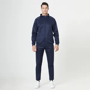Full view of navy blue men's tracksuit featuring a zipper jacket and matching trousers