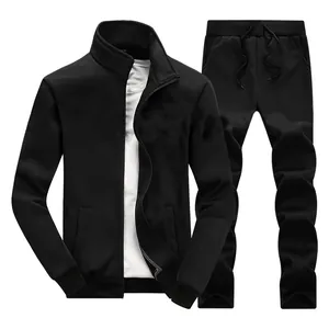 Close-up of black sports tracksuit with zipper jacket and matching drawstring trousers