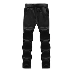 Detail view of black drawstring joggers with elastic waist and side pockets for men