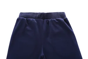 Close-up of the elastic waistband on navy blue men's casual sportswear trousers