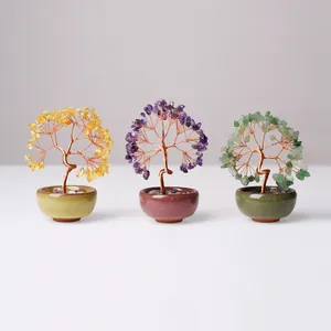 Three handmade crystal money trees with wire branches in ceramic bowls for desk decor