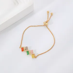 Verstellbares goldenes Bolo-Armband mit bunten Zirkonia und weißen Kristallen