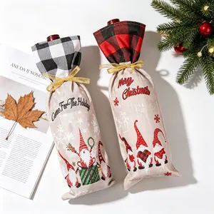Christmas gnome wine bottle gift bags with buffalo plaid cuffs and Merry Christmas print