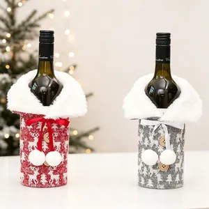 Knitted Christmas wine bottle covers with reindeer patterns and faux fur collars