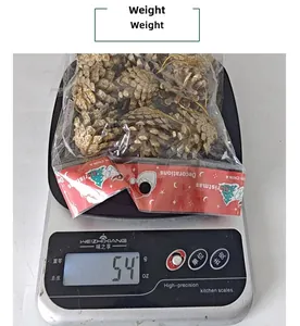 Detailed weight measurement of 9-piece pine cone Christmas tree ornaments in packaging