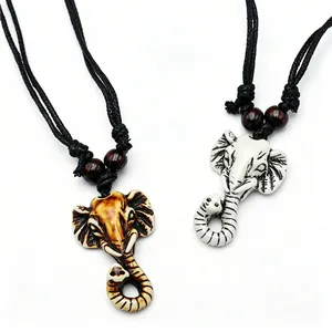 Resin elephant head pendant necklace with tribal totem and bohemian ethnic style jewelry