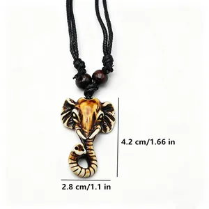 Tribal resin elephant head pendant necklace with brown beads on black woven cord