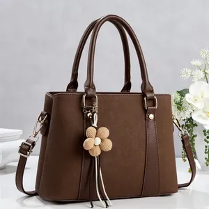 Minimalist dark brown large capacity tote bag with flower pendant and shoulder strap