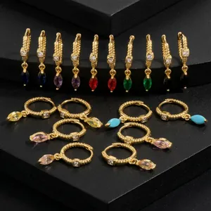Close-up of 18K gold-plated marquise gemstone hoop earrings in various colors