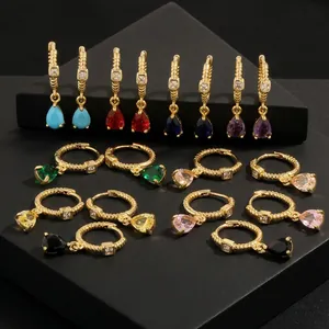 Detail of 18K gold-plated hoop earrings with multi-color teardrop-shaped zircons