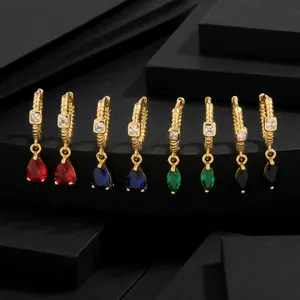 Detailed view of 18K gold plated hoop earrings with multi-color teardrop gemstones