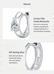 Λεπτομέρεια από Moissanite D VVS1 και σήμανση S925 σε ασημένιο σκουλαρίκι κρίκο