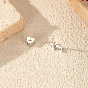 S925 sterling silver shark shaped stud earrings with unique heart screw backs detail