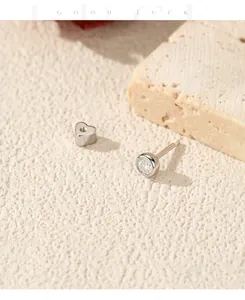 Macro detail of S925 sterling silver moissanite cartilage stud with heart-shaped back piece