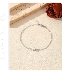 Elegant S925 sterling silver bracelet featuring a shimmering pear-cut moissanite stone.