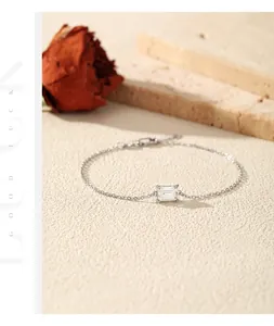 Detail of S925 sterling silver bracelet featuring a radiant emerald-cut moissanite stone