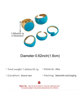 Detail view showing measurements and material of blue enamel stackable ring set.