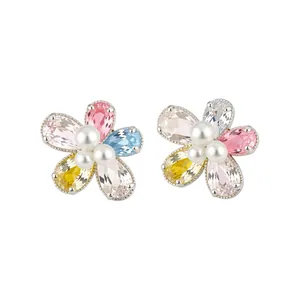 Elegant floral stud earrings featuring colorful zircons and pearls in silver settings