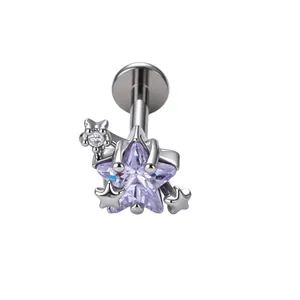 Titanium alloy cartilage stud earring featuring a purple star-shaped zircon and small stars.