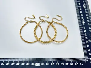 Detailed comparison of 3mm, 4mm, and 5mm 18K gold-plated beaded bracelets with size scale