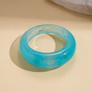 Minimalist blue marble patterned resin bangle bracelet for women, SKU variant close-up
