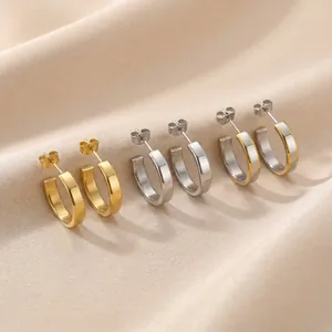 Three pairs of C-shaped titanium steel earrings in gold, silver and two-tone finishes