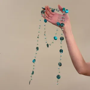 Elegant teal butterfly shell and bead long necklace for beach vacation fashion styling