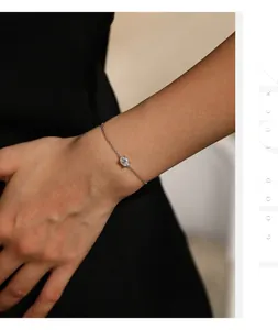 Close-up of a delicate S925 sterling silver bracelet featuring a 1ct moissanite stone.
