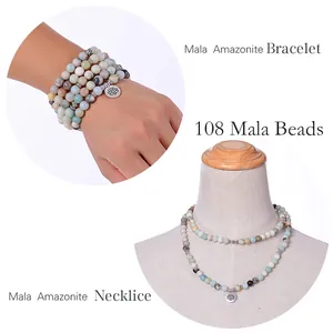 108 grani Mala in amazzonite con ciondolo loto, usati come bracciale e collana.