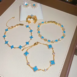 Elegante set gioielli fiori in resina con bracciali dorati anello orecchini