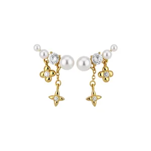 Elegant 18k gold plated earrings featuring pearls and zircon flower star charms