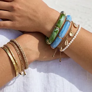 Bohemian stacked resin bamboo bracelets with gold shell charms and white pearls jewelry