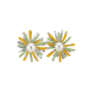 Elegant firework-shaped pearl stud earrings with green and yellow enamel petals.