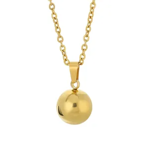 Minimalist gold mirror finish solid sphere pendant necklace crafted from titanium steel