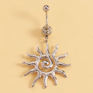 Detailed view of a bohemian stainless steel belly button ring featuring a swirl sun pendant