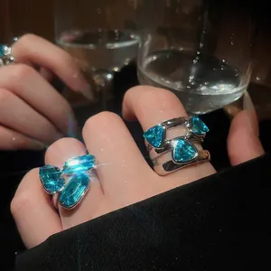Elegant women's open rings featuring sparkling blue rhinestones in a vintage luxury style