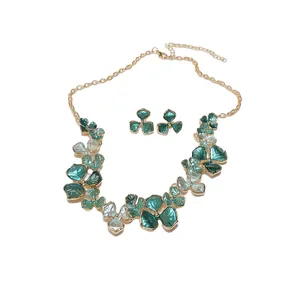 Vintage green floral necklace and earring set with metallic painted petals and gold finish