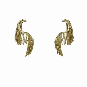 Elegant gold geometric twisted earrings with cascading long fringe tassels for a statement look