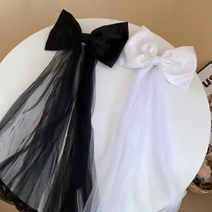 Barrettes à cheveux grand nœud en tissu avec longs voiles en résille noir et blanc