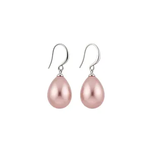 Elegant pink pearl teardrop earrings with silver-toned hooks in minimalist style