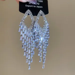 Elegant silver tassel earrings with rectangular cubic zirconia and cascading fringes